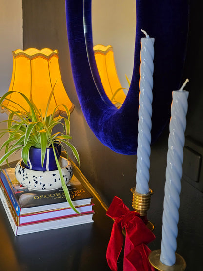 Close up of royal blue silk velvet mirror frame showing deep colour and pile