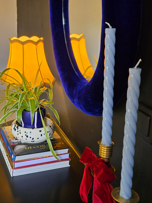 Close up of royal blue silk velvet mirror frame showing deep colour and pile