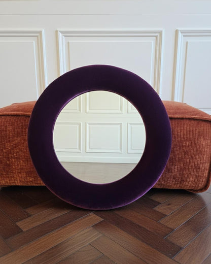 Close up of deep plum silk velvet mirror frame showing texture and sheen