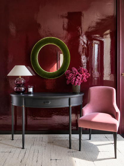 Olive green velvet round wall mirror 60cm styled in earthy mid-century interior