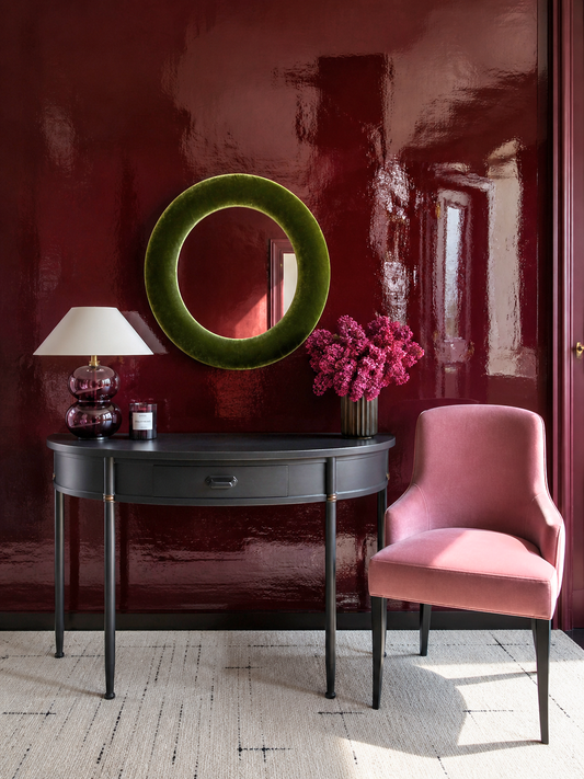 Olive green velvet round wall mirror 60cm styled in earthy mid-century interior